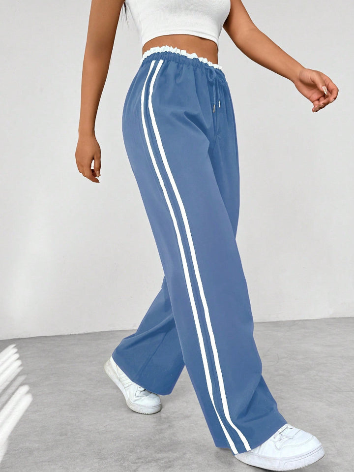 Pantalón Deportivo para Mujer de Pernera Ancha con Rayas Laterales