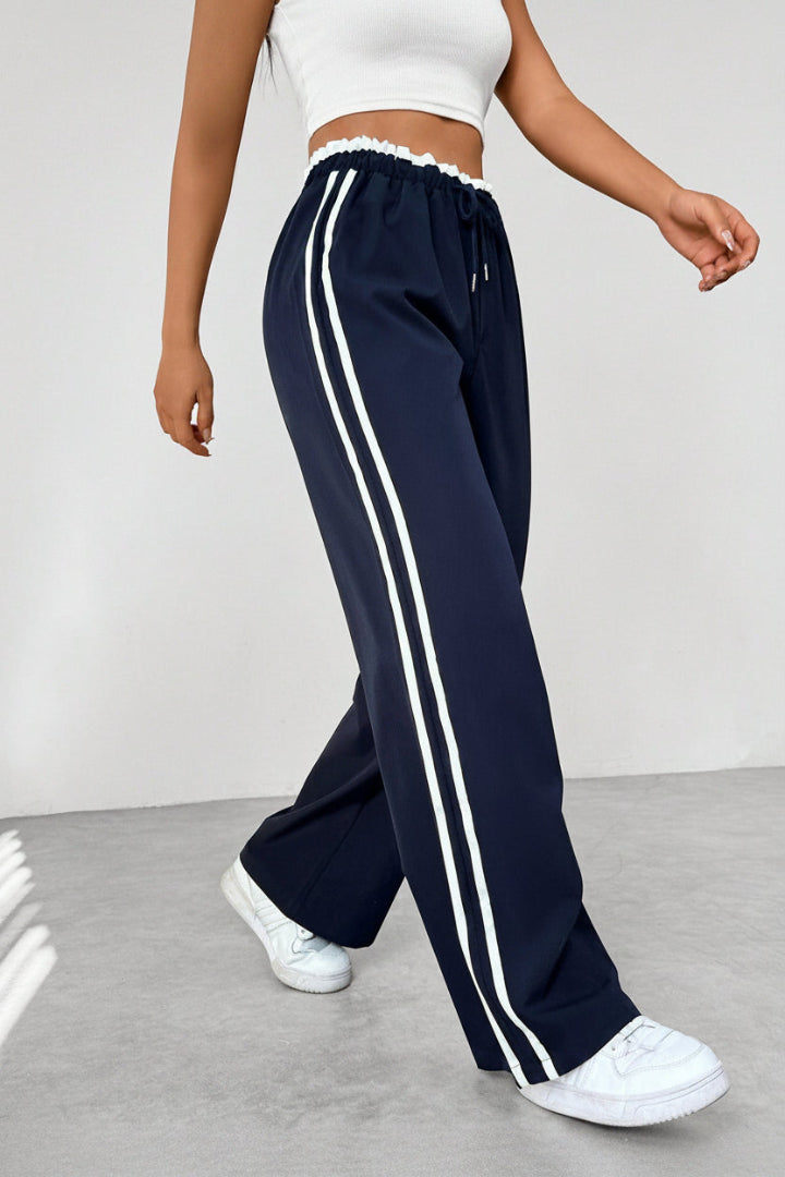 Pantalón Deportivo para Mujer de Pernera Ancha con Rayas Laterales
