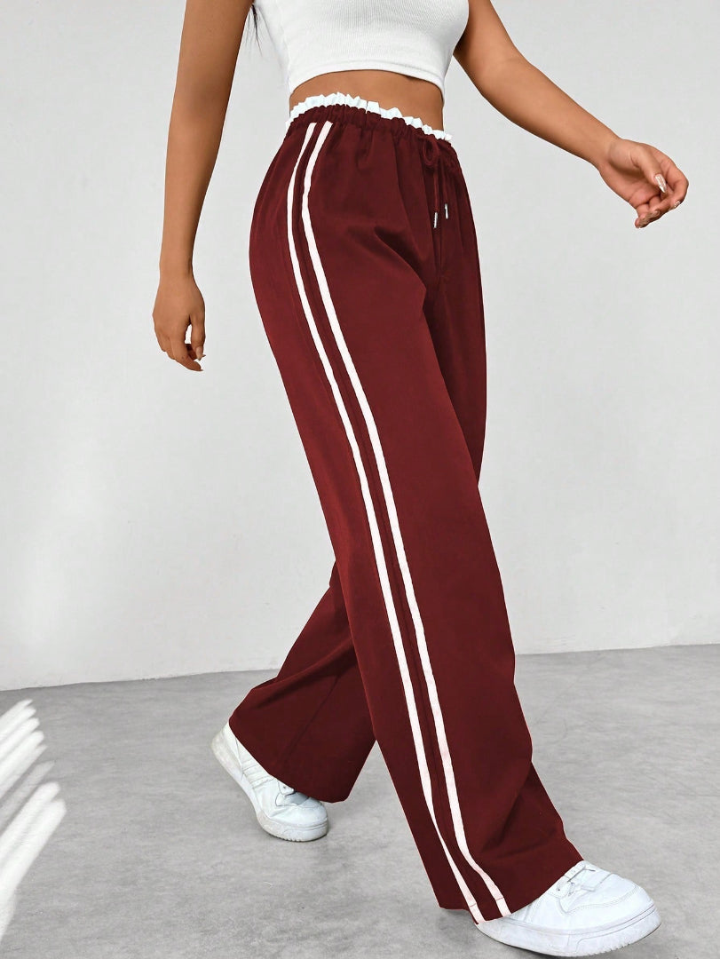Pantalón Deportivo para Mujer de Pernera Ancha con Rayas Laterales