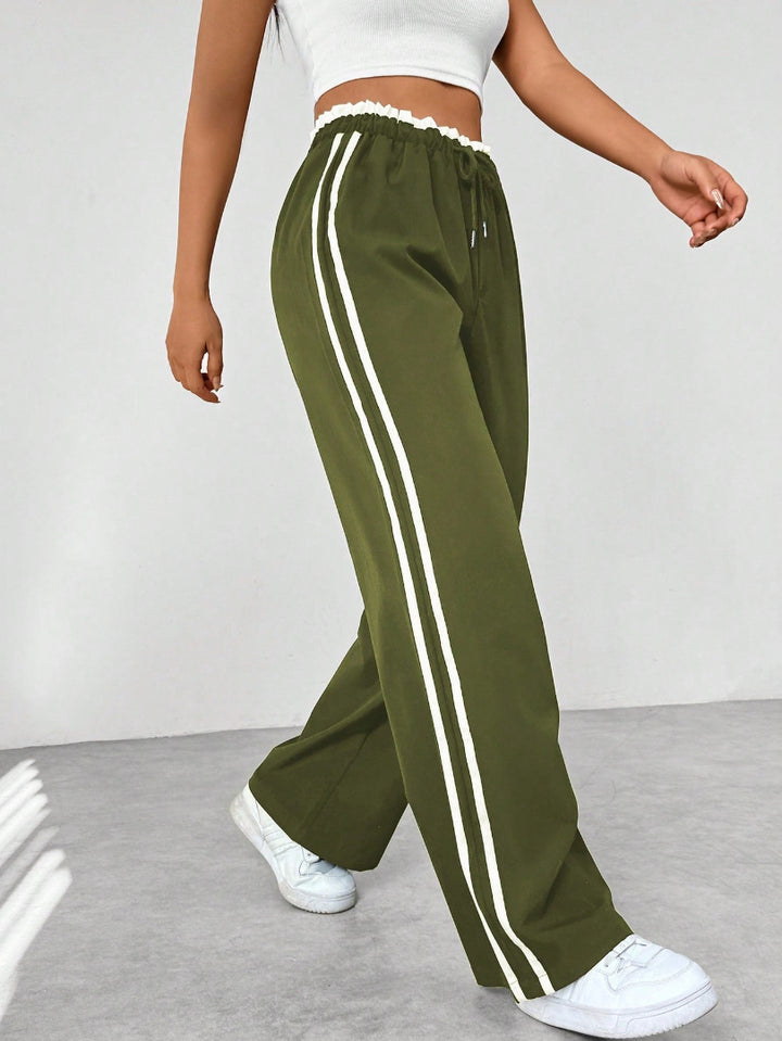 Pantalón Deportivo para Mujer de Pernera Ancha con Rayas Laterales