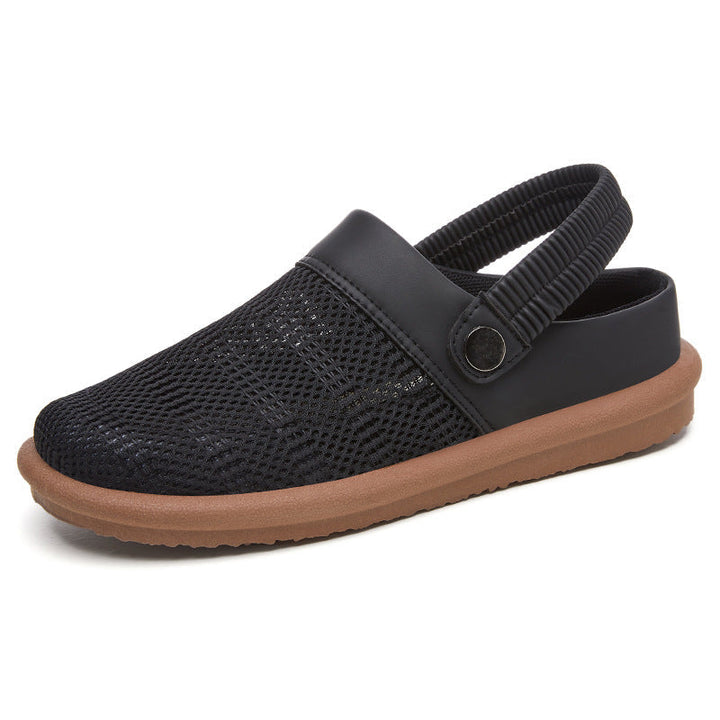 Zuecos Planos con Tira Trasera – Negro